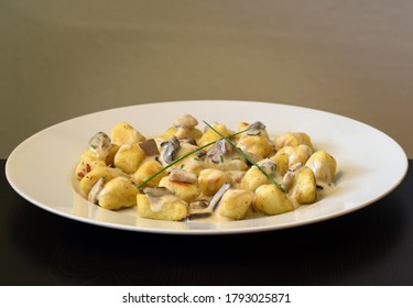 Potato gnocchi with mushroom sauce - Powered by Shutterstock