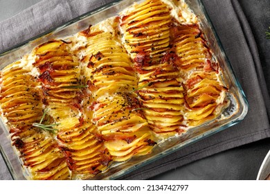 Potato Gratin, Backed Potato Slices With Bacon, Ham, Creamy Sauce. Top View.  Potato Casserole