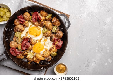 Potato Hash With Fried Eggs And Meat Pastrami For Breakfast Branch