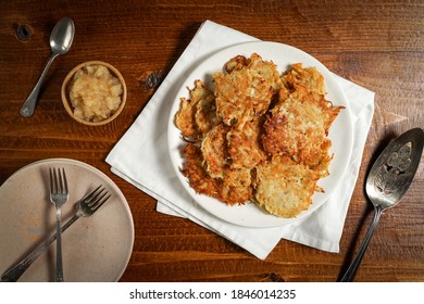 Potato Latkes On A Plate With Applesauce