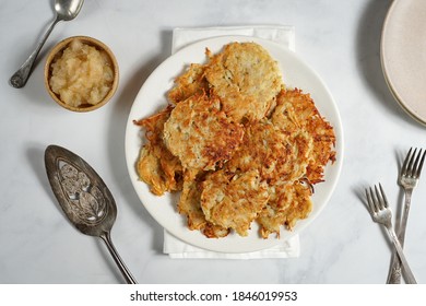 Potato Latkes On A Plate With Applesauce