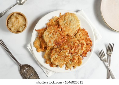 Potato Latkes On A Plate With Applesauce