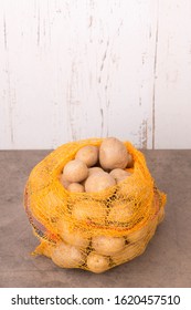 Potato Sack On A Textured Background, Empty Copy Space