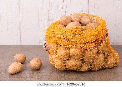 Potato Sack On A Textured Background, Empty Copy Space