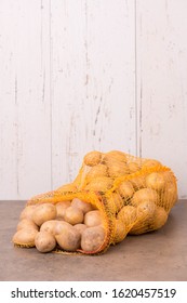 Potato Sack On A Textured Background, Empty Copy Space