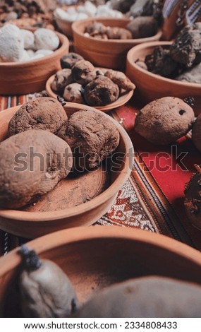 Potato, sweet potato and dried tubers with ancestral Andean techniques. Close up, Grains such as beans.