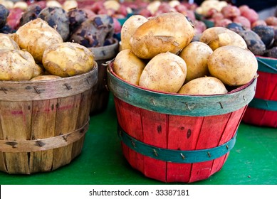 Potatoes In Bushel Baskets At Market