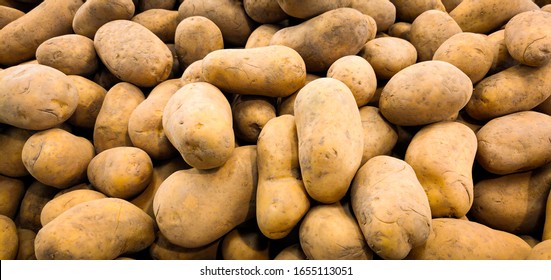 Potatoes. Texture vegetable white young potato.