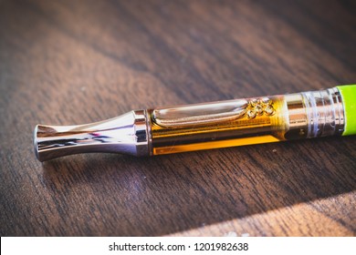Potent cannabis oil filled cartridge up close.