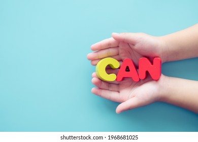 Potential Energy Motivation Word CAN On Kid Hands On Blue Background.Child Development And Dream Career In Future.growth Or Change Attitude Yourself Concept.Kid Child Can Do.success Challenge And Win.