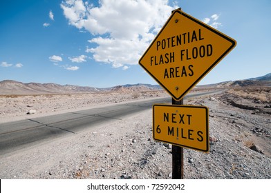 Potential Flash Flood Area Road Warning Sign In Death Valley