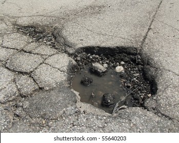 Pothole In Road After Spring Thaw