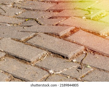 Pothole In A Sidewalk Due To Lack Of Maintenance. Safety Concept