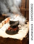 Potjie, South African Braai.

Traditional Arfikaans cooking in an iron pot ("potjie", pronounced 