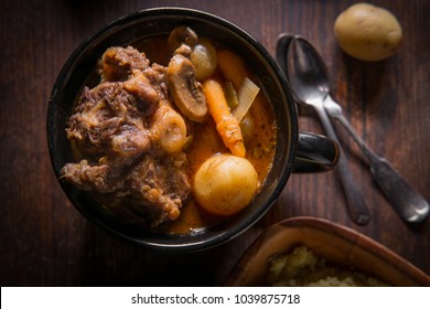 Potjiekos South African Oxtail Stew With Baby Gold Potatoes Carrots And Button Mushrooms