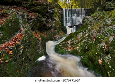 "Černohorský potok" in the Giant Mountains in autumn colors. One of the many smaller waterfalls along the stream."Černohorský potok" in the Krkonoše Mountains in autumn colors. Czech republic