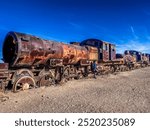 Potosi department, Uyuni City, Bolivia - June 12, 2024: Train cemetery. It is a place of abandoned trains on the edge of the salt flats of the Salar de Uyuni in Bolivia.