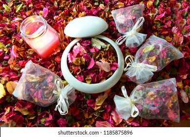 Potpourri or dried petals flowers colorful and scented candles