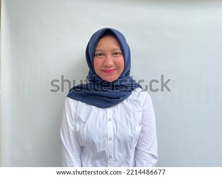 potrait of happy young asian woman smiling, cheerful and look at the camera. fashion people life style concept