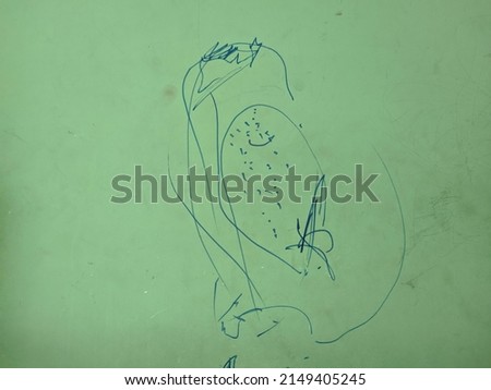 Potrait toddler's scribbles on the wall