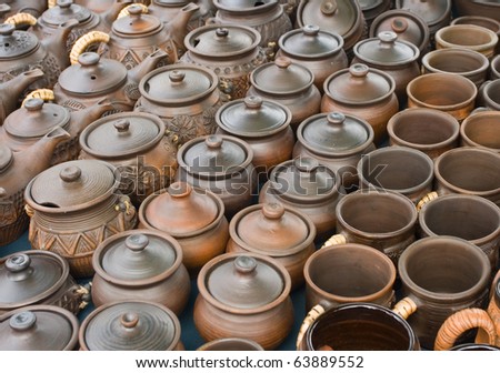 Similar – many part colorful tin buckets at the flea market