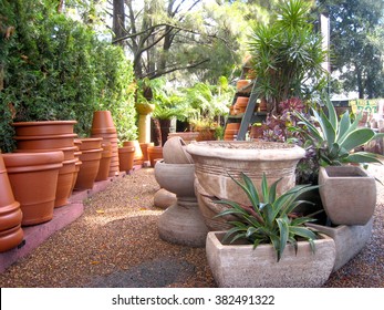 Pots Stacked in the Garden Centre - Shutterstock ID 382491322