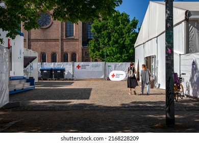 Potsdam, Germany 22 Mai 2022: Tent Of The Red Cross Society, Volunteer Assistance For Refugees From Ukrina. High Quality Photo