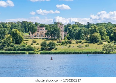 Potsdam, Germany -  July 12, 2020: Babelsberg Palace And Adjoining Eponymous Park Designed By The Famous Architect Peter Joseph Lenné With Local People Enjoying A Warm Day