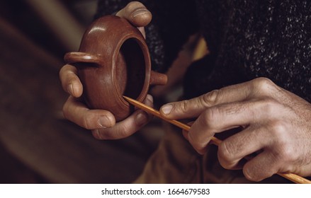 Potter Makes A Traditional Chinese Teapot From Yixing Clay. Handmade Clay Teapot For Chinese Tea Ceremony. Purple Sand Teapot. High Quality Photo