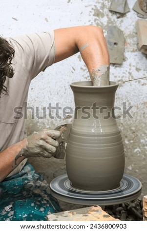 Similar – Beautiful ceramist owner looking to the camera while smiling