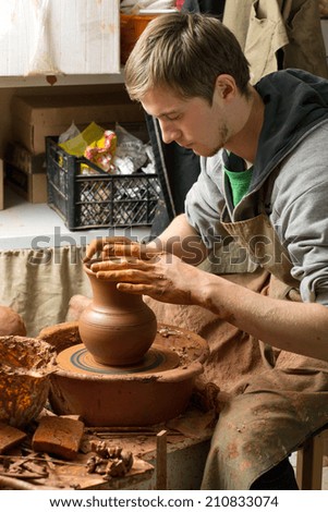 Image, Stock Photo hands working with clay in a pottery |clay transfer