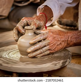 Potter at work makes ceramic dishes. India, Rajasthan. - Powered by Shutterstock