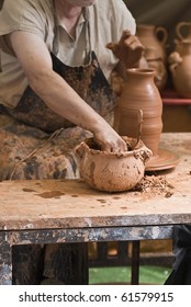 Potter working at his workshop.