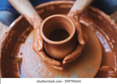 Pottery Artisan Making Fireclay Jugs In His Atelier