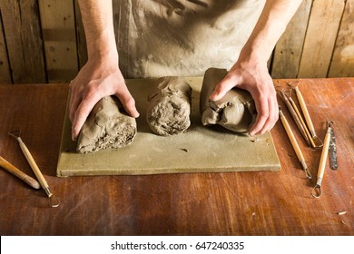 Pottery, Clay, Ceramics Art Concept - Closeup On Hands Of Young Master With The Large Pieces Of Fireclay