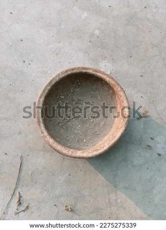 Pottery is the process and the products of forming vessels and other objects with clay and other raw materials, which are fired at high temperatures to give them a hard and durable form. 