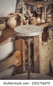 Pottery Studio, Empty Potter's Wheel, Pottery From Clay On The Table