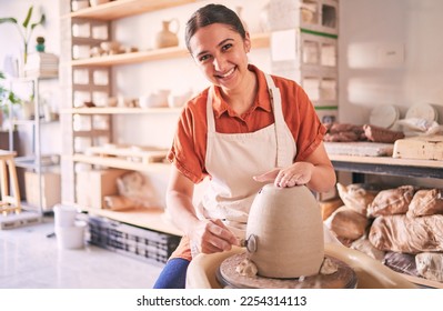 Pottery wheel, workshop portrait and happy woman design sculpture mold, studio manufacturing or art product. Creative, vase molding or startup small business owner, artist or person in ceramic store - Powered by Shutterstock