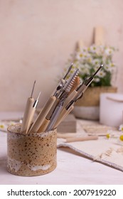 Pottery Working With Clay Pottery Tools On A Light Background 