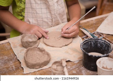 Pottery Workshop For Kids, Raw Clay, Sculpting Tools, Glazing And Painting Clay Pots