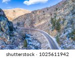 Poudre River canyon with a scenic road in winter scenery, aerial view