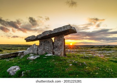 Poulnabrone dolmen, photographed here at sunset, is a portal tomb located in the Burren, County Clare, Ireland