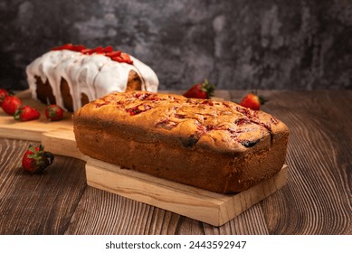 Pound cake with homemade strawberry jam. Pound cake and strawberries on a wooden table. - Powered by Shutterstock