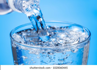 Pour Carbonated Water Into A Glass