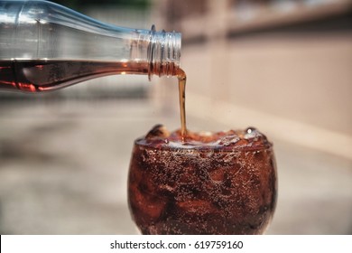 Pour The Cola From Bottle To Glass , Fresh Drinking , Drinking Soda