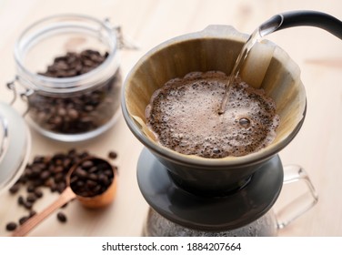 Pour Hot Water Over The Coffee Powder.
Make Drip Coffee.