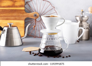 Pour over coffee being made with a kettle and glass carafe