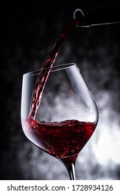 Pour Red Wine And Enjoy Together