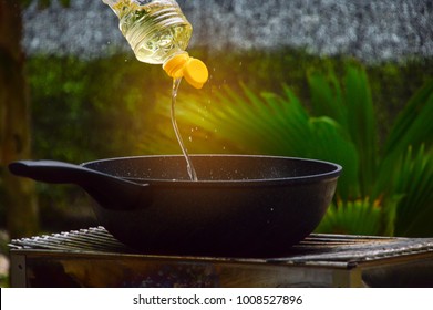 Pour The Vegetable Oil Into The Cooking Pan.