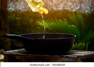 Pour The Vegetable Oil Into The Cooking Pan.